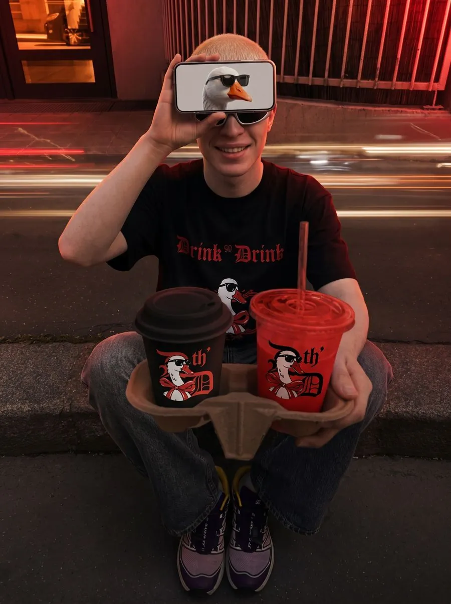 splash of coffee caught mid-pour, branded cup
