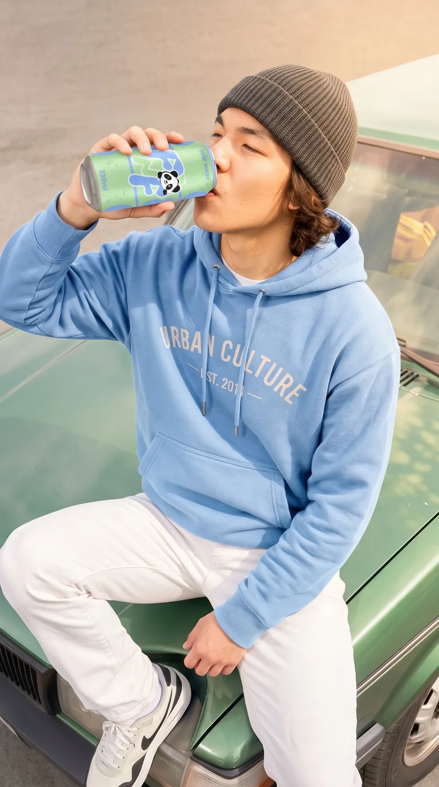man drinking from a FRESH N FRESH can